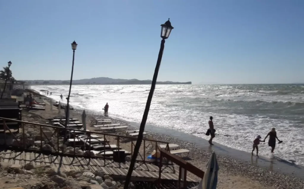 Corfu Acharavi beach people on the beach 1920w 1024x638