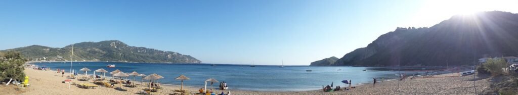 Corfu Afionas beach panoramic sunset 1920w 1024x188