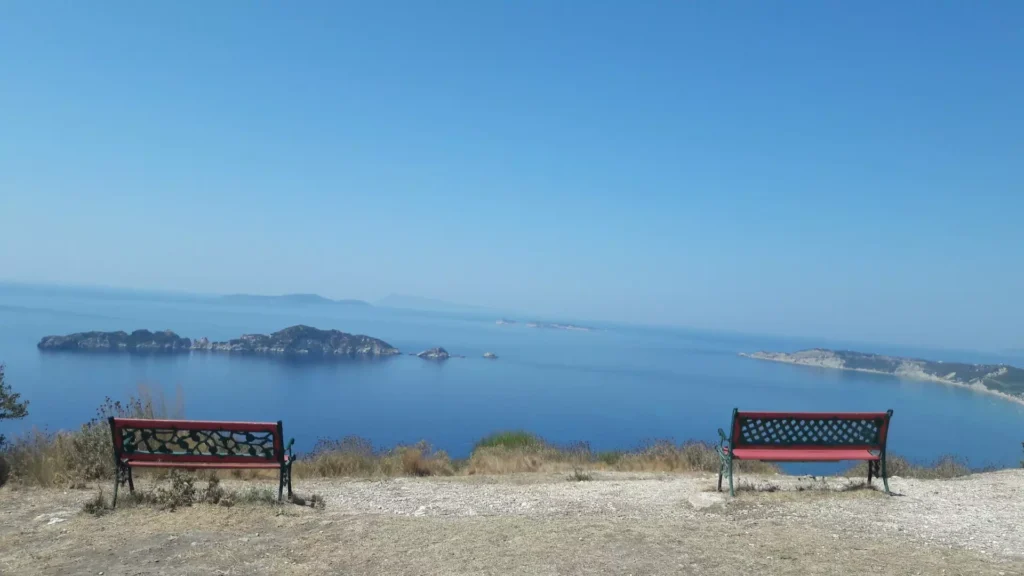 Corfu Afionas village benches view 1920w 1024x576