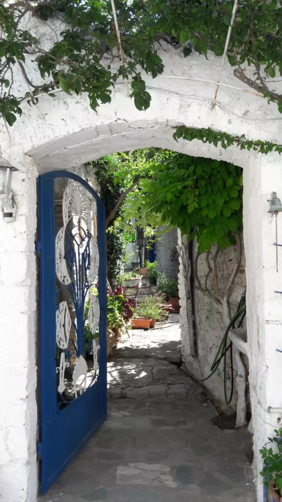 Corfu Afionas village traditional courtyard 1920w 576x1024