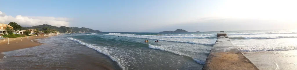 corfu arillas beach dock waves panoramic 1920w 1024x244
