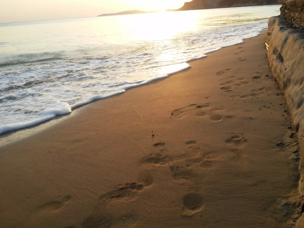corfu arillas beach footprints in the sand 4 1920w 1024x768