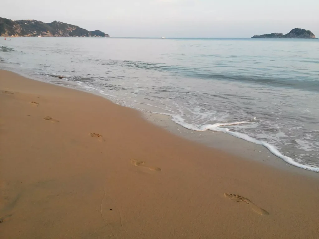 corfu arillas beach footprints in the sand 5 1920w 1024x768