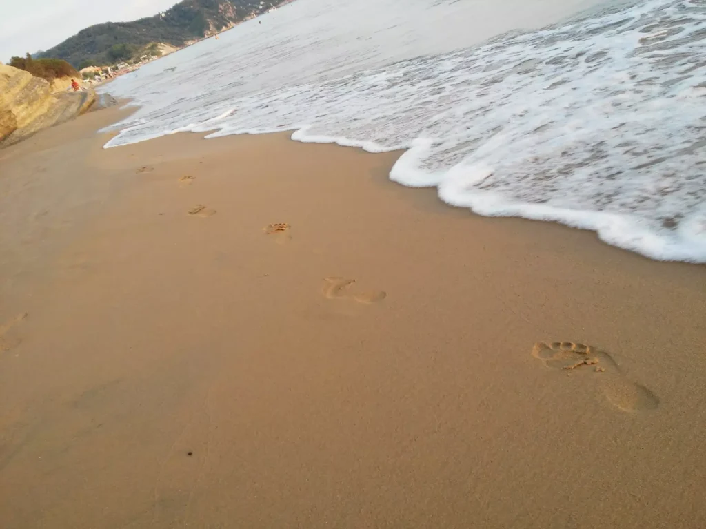 corfu arillas beach footprints in the sand 8 1920w 1024x768