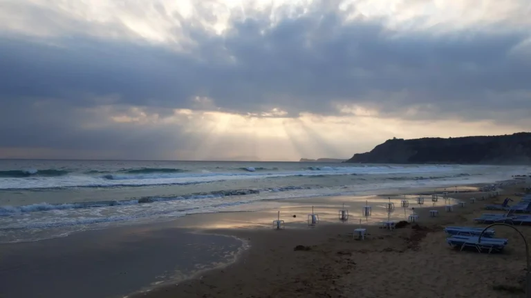corfu arillas beach waves clouds and sun rays 11 1920w 768x432
