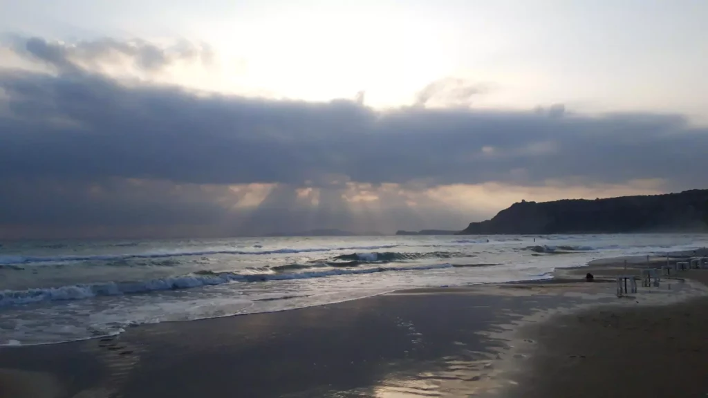 corfu arillas beach waves clouds and sun rays 3 1920w 1024x576