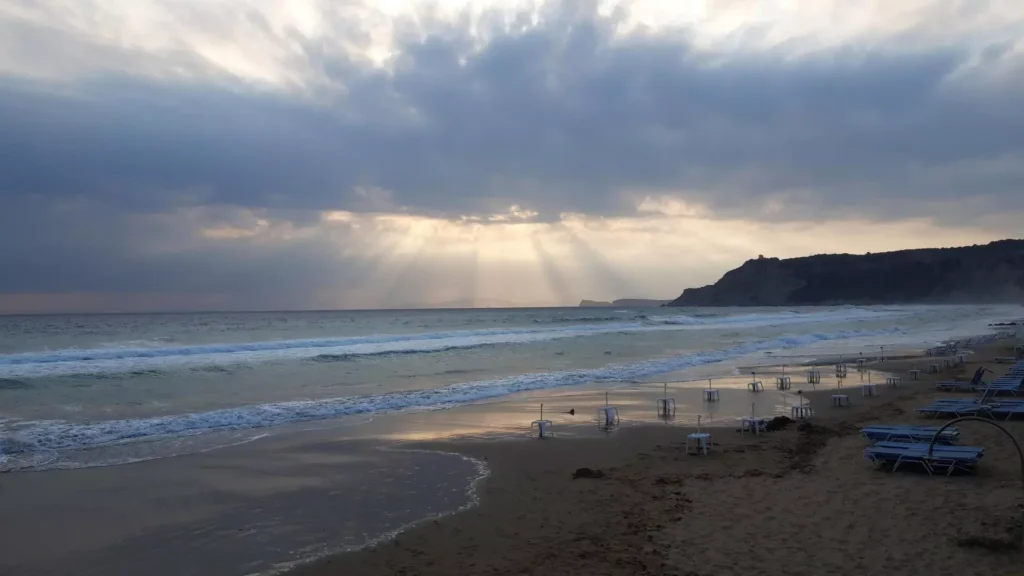 corfu arillas beach waves clouds and sun rays 9 1920w 1024x576