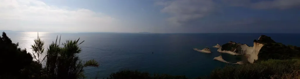 corfu cape drastis hill panoramic view dark 1920w 1024x271