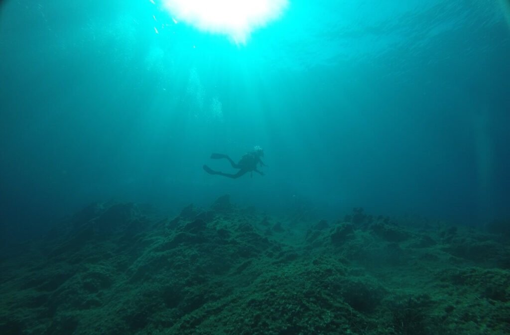 palaiokastritsa diver below light 1024x673