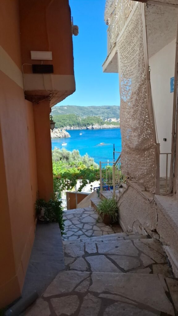 The way to Platakia beach through cobblestone path